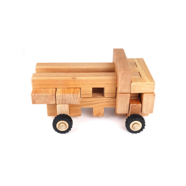 Bauspiel - Big Wheel Kit 30 pcs - Open ended block play. wooden blocks and wooden wheels assembled to represent a truck
